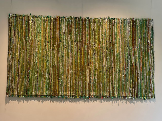 Emerald Glimmer Fiber Art Sheathcore fiber Recycled Mylar Balloons and Dry cleaning hangers by Suzanne Tick