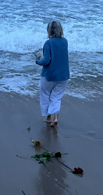 Tossing Puja remnants on Guru Purnima moonrise Fire Island Suzanne Tick - 2025