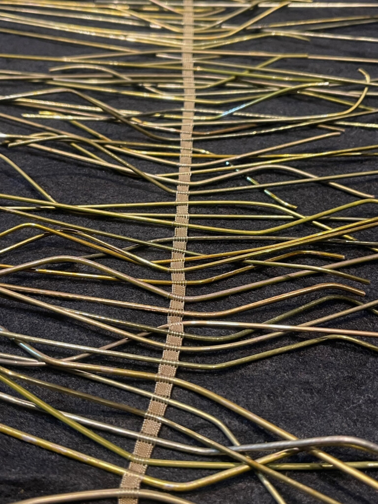 Suzanne Tick Counterbalance recycled dry cleaning hangers sheath core fiber